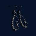 Moon stone swirl earrings