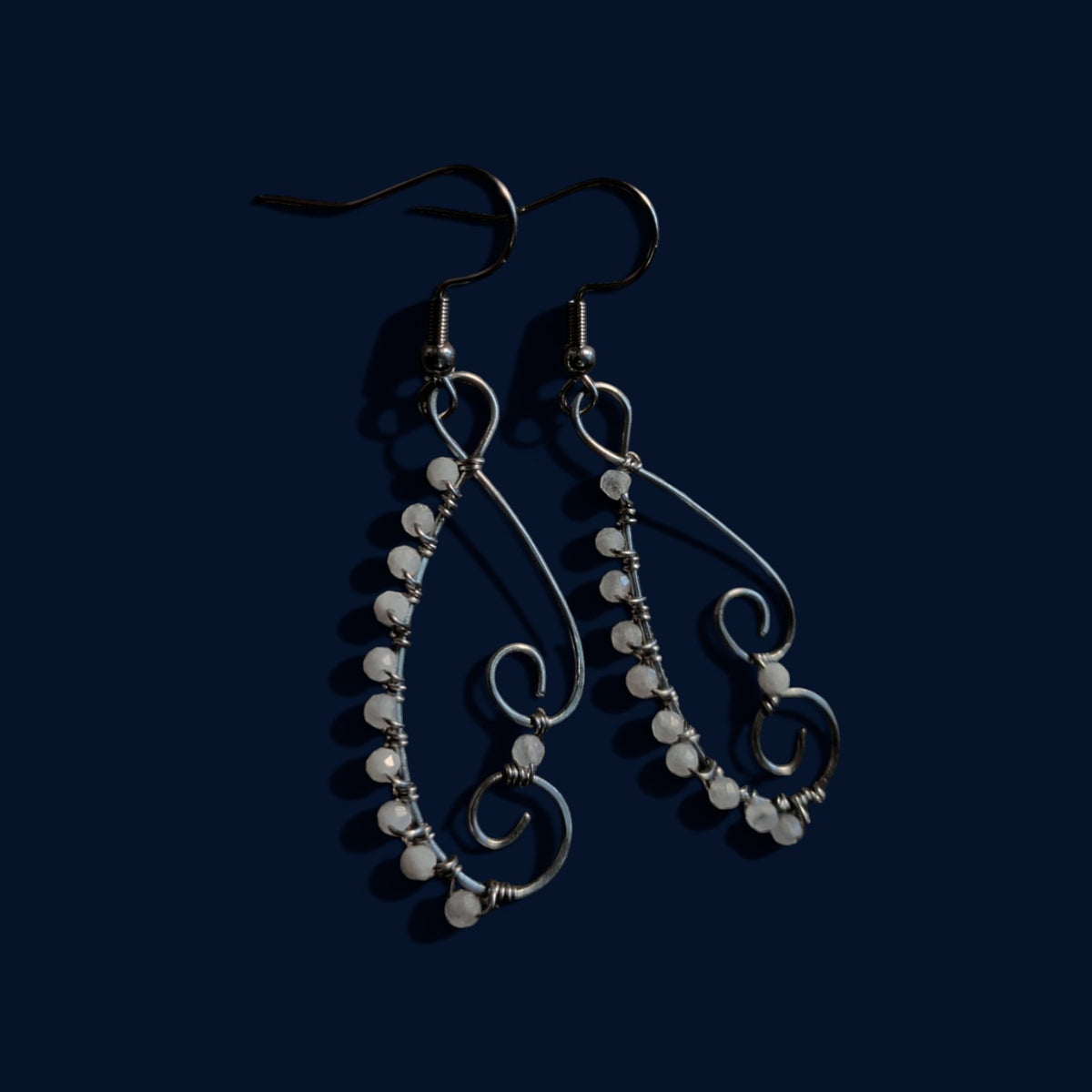 Moon stone swirl earrings